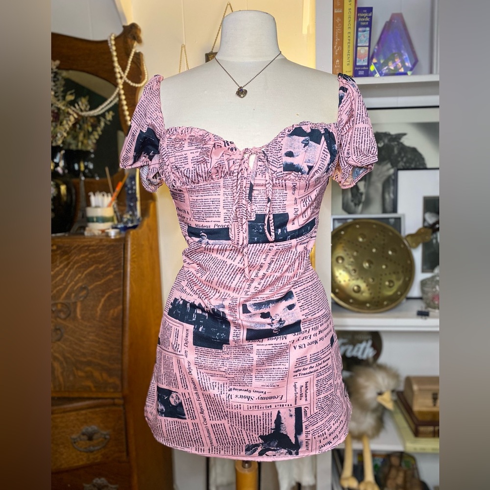 Barbie pink newspaper print mini dress
